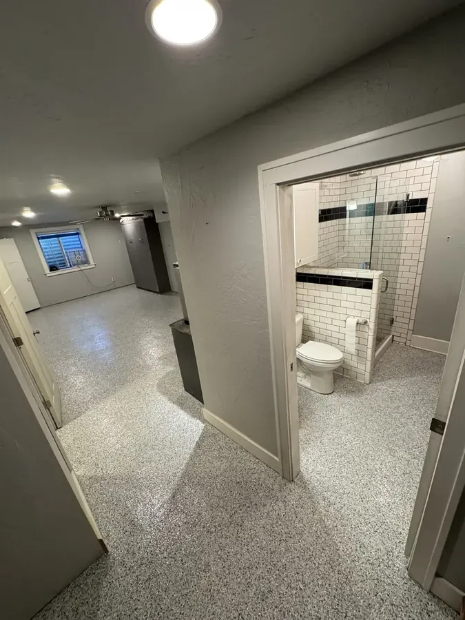 Concrete floor after repair and diamond grinding, ready for polyaspartic coating application